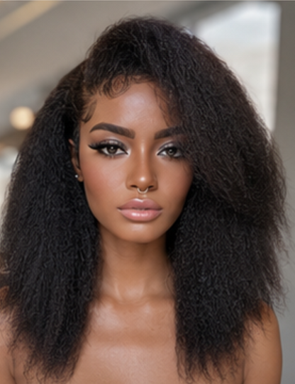 Woman with long, curly hair against a neutral background